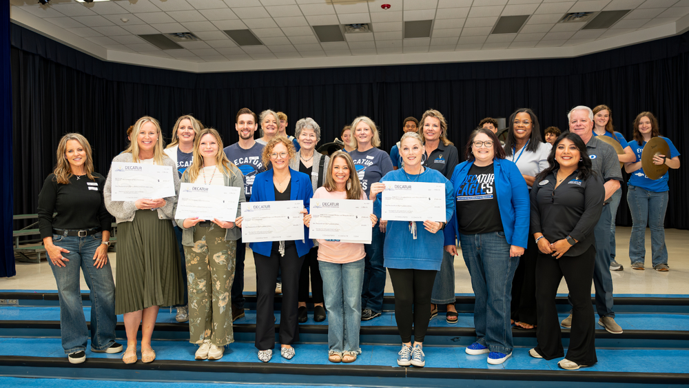 Rann Grant Teacher Award Recipients ar pictured together holding their giant checks