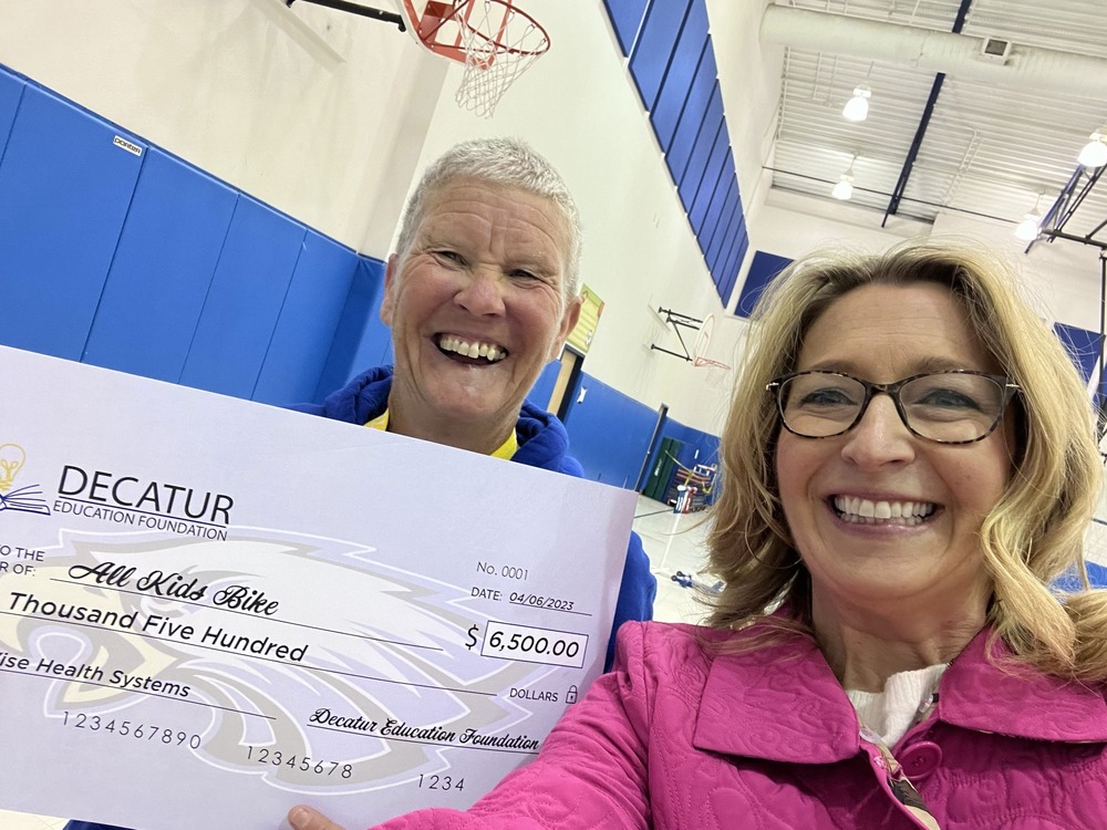 Photo of two teachers celebrating with their grants