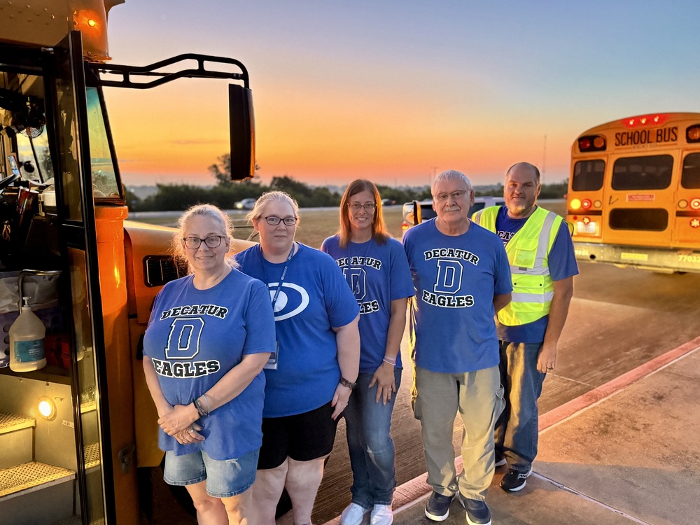 Bus drivers at Carson Elementary pose for a photo after an evacuation drill