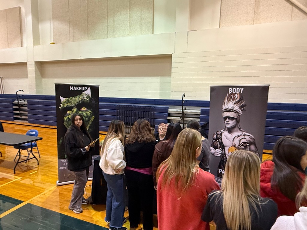 Students visiting recruiters at college fair