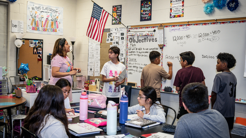 Photo of Rann Teacher Blanca Espinoza talking to students during a math lesson