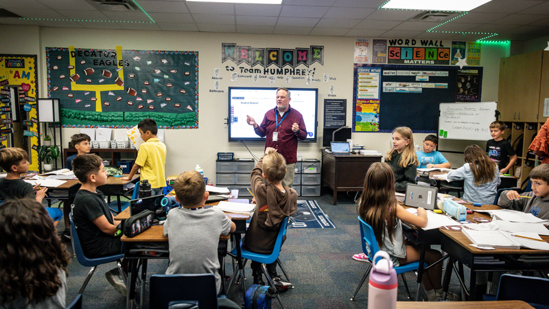 Photo of Cliff Humphrey teaching in his classroom 