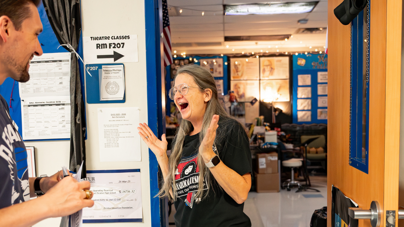 Theatre Teacher Rebecca Phillips reacts with great surprise to her grant award