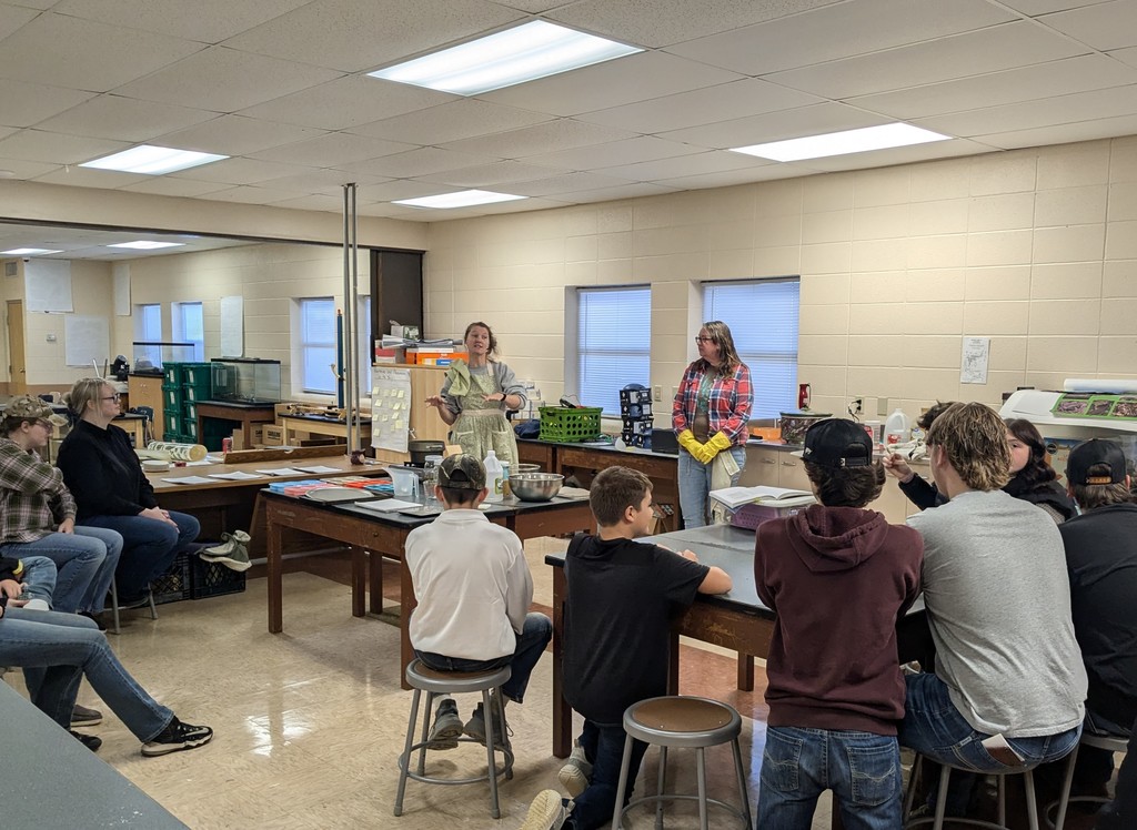 Students watching a soap making demonstration