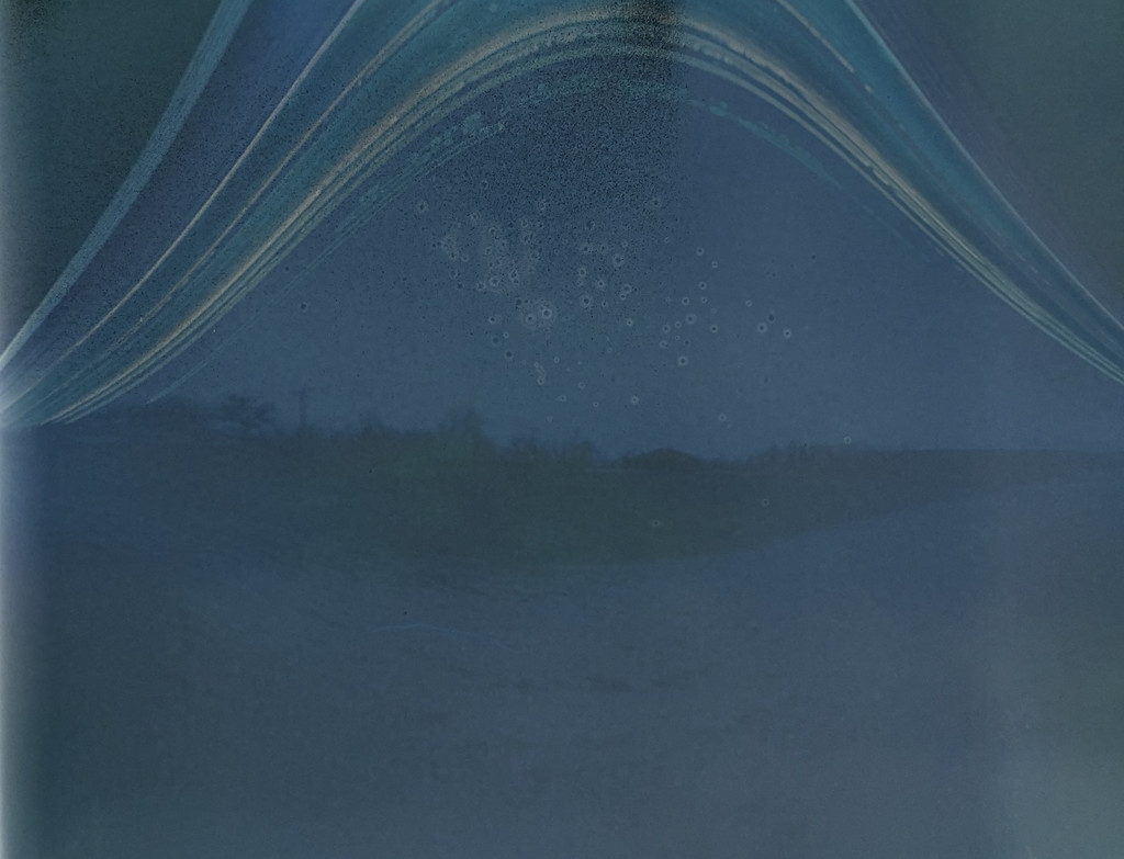 an image on photosensitive paper showing sun trails