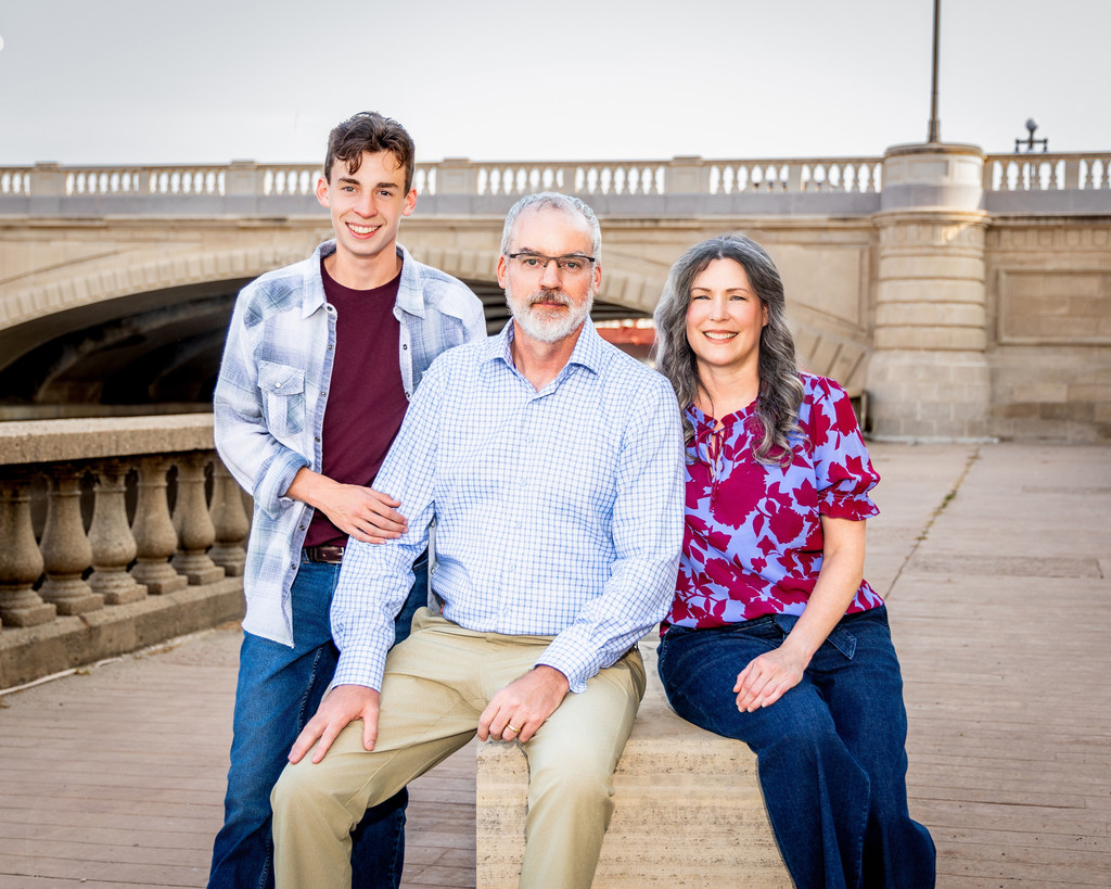 Family portrait of Luke, his wife Christie, and son Parker (18).