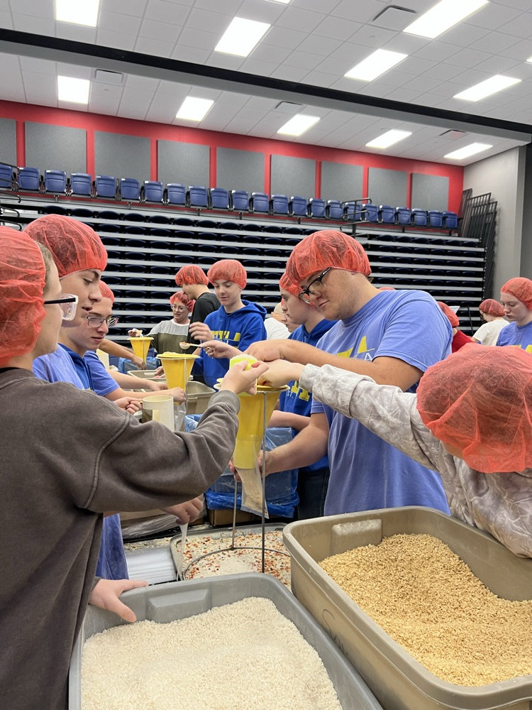 Filling the bags to be shipped overseas.