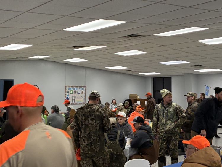 Enjoying coffee, conversation and breakfast before daybreak! 