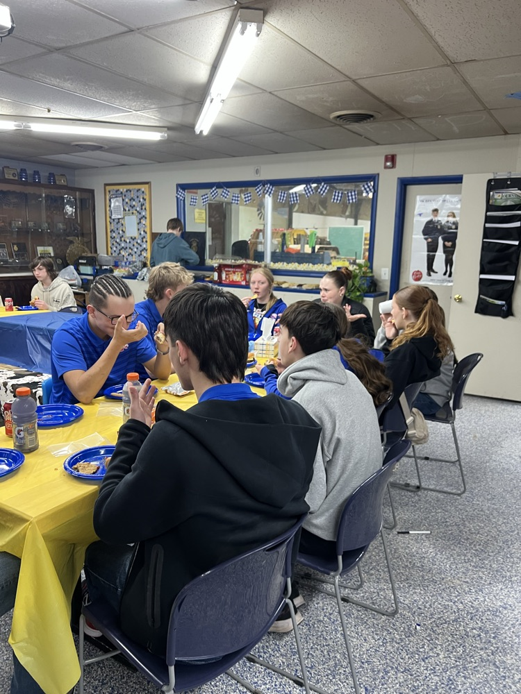 Enjoying their time with their teams while eating lunch! 