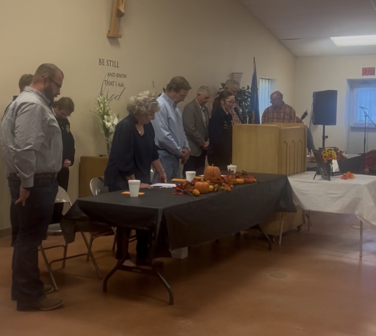 Piper giving the invocation.