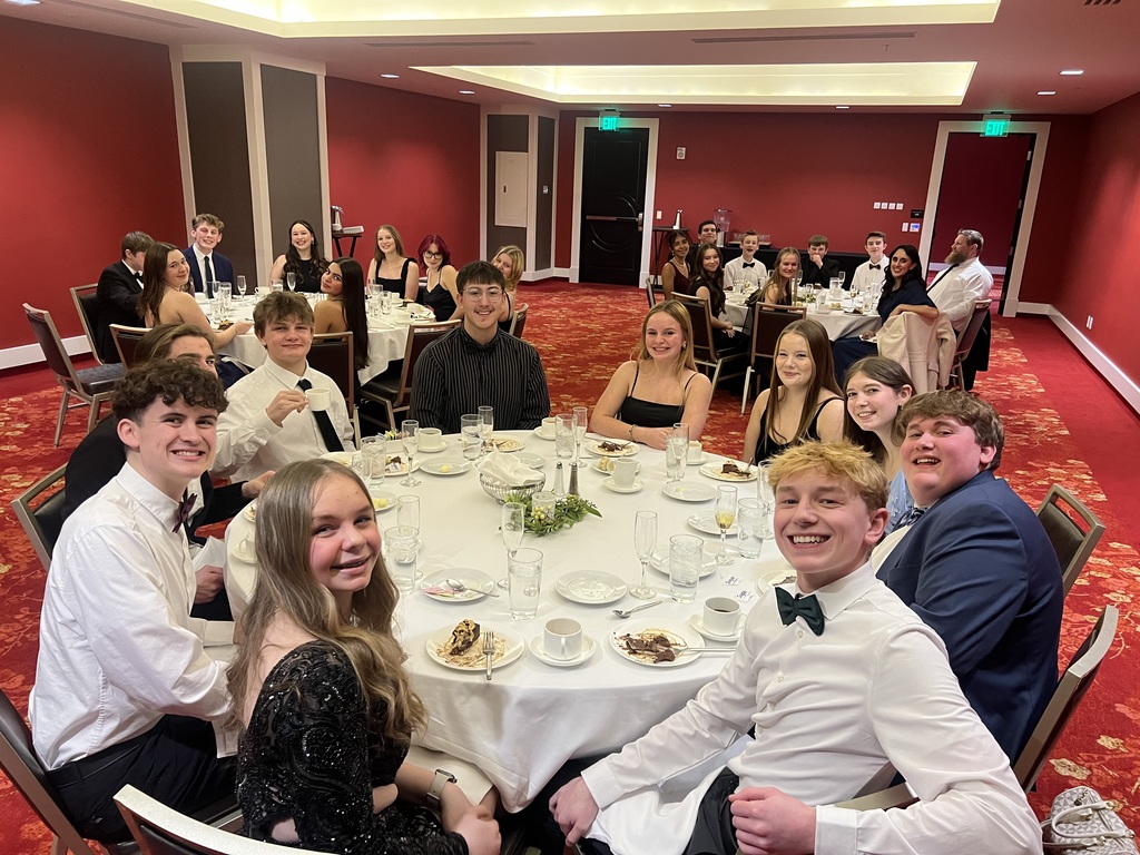 Photos of our Deca Students - Posing at a fancy dinner