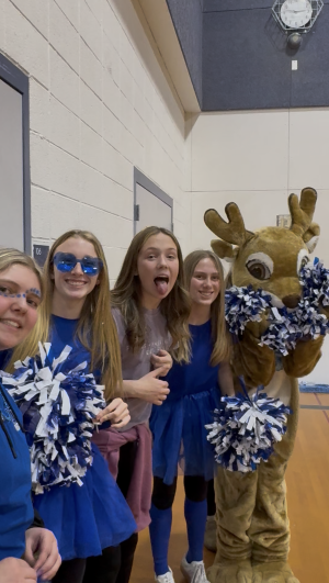 Middle School students posing for spirit day - blue