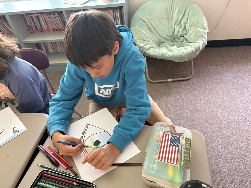 Arcadia students focused on drawing surrealist pieces. 