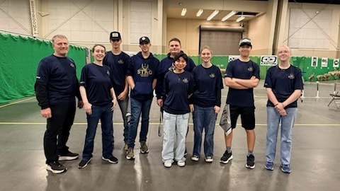 Deer Park Archery at Nationals, posing and smiling. 