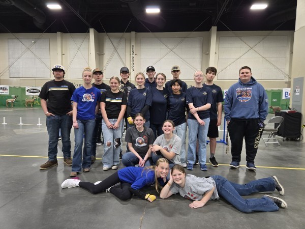 Deer Park Archery at Nationals, posing and smiling. 