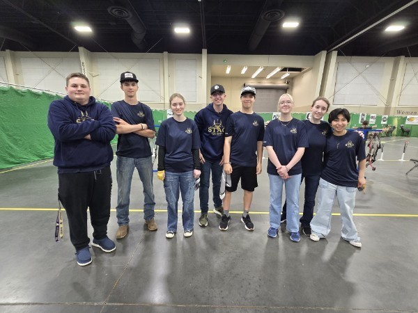 Deer Park Archery at Nationals, posing and smiling. 