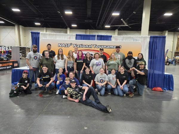 Deer Park Archery at Nationals, posing and smiling. 