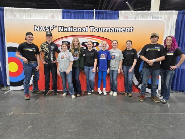 Deer Park Archery at Nationals, posing and smiling. 