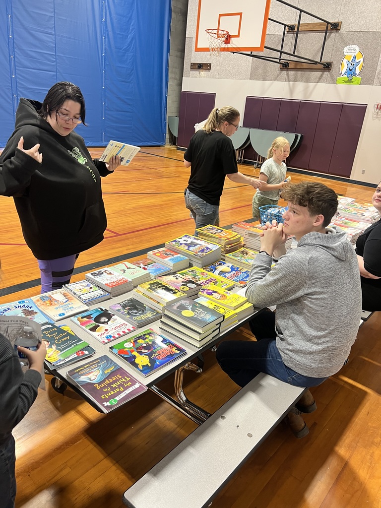 Photos highlighting a few moments of parents at school with their students for  Arcadia family fun night.