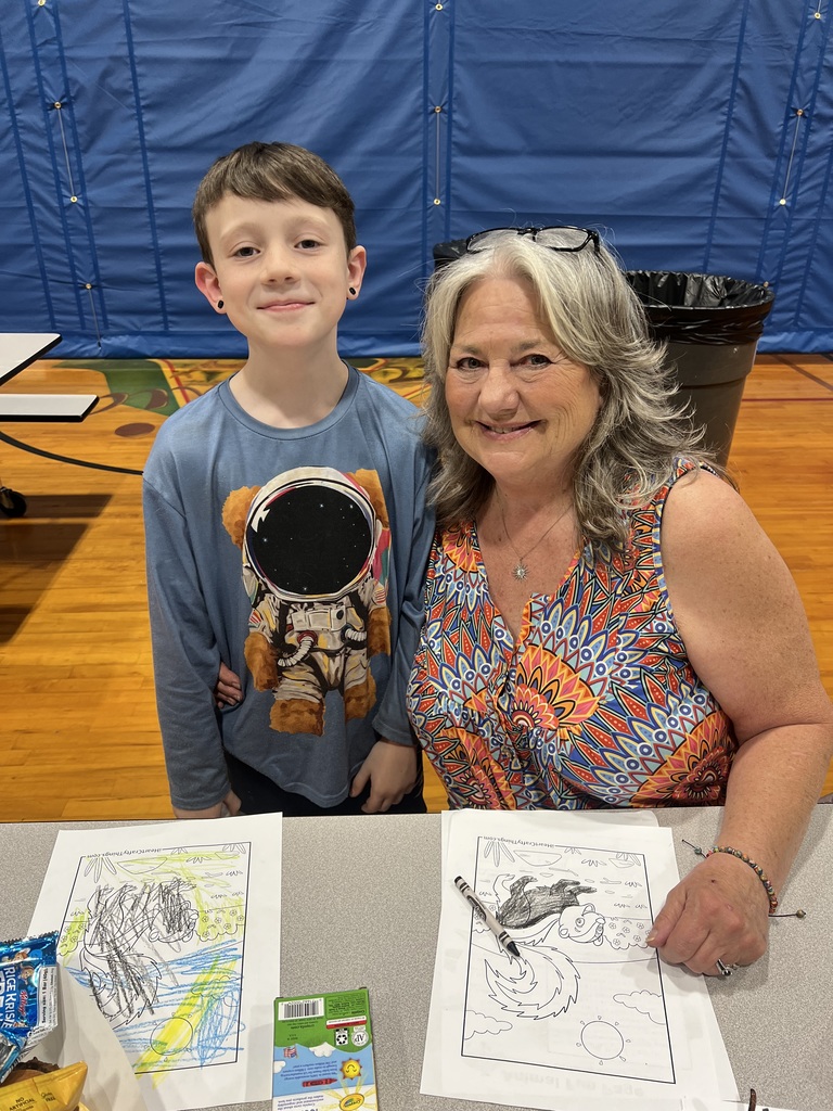Photos highlighting a few moments of parents at school with their students for  Arcadia family fun night.