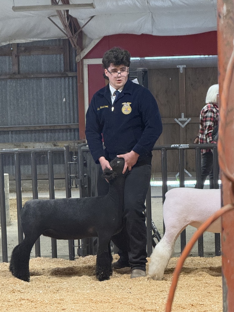 FFA Junior livestock photos of students and their animals