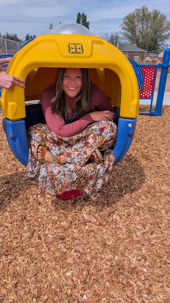 Photos of staff posing in the new ECEAP playground 