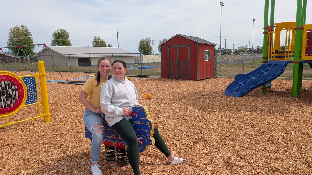 Photos of staff posing in the new ECEAP playground 