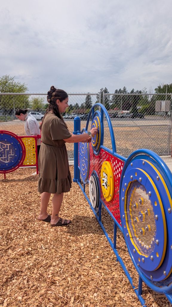 Photos of staff posing in the new ECEAP playground 