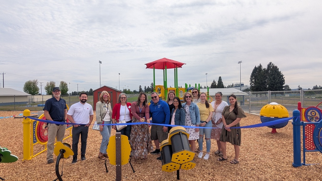 Photos of staff posing in the new ECEAP playground 