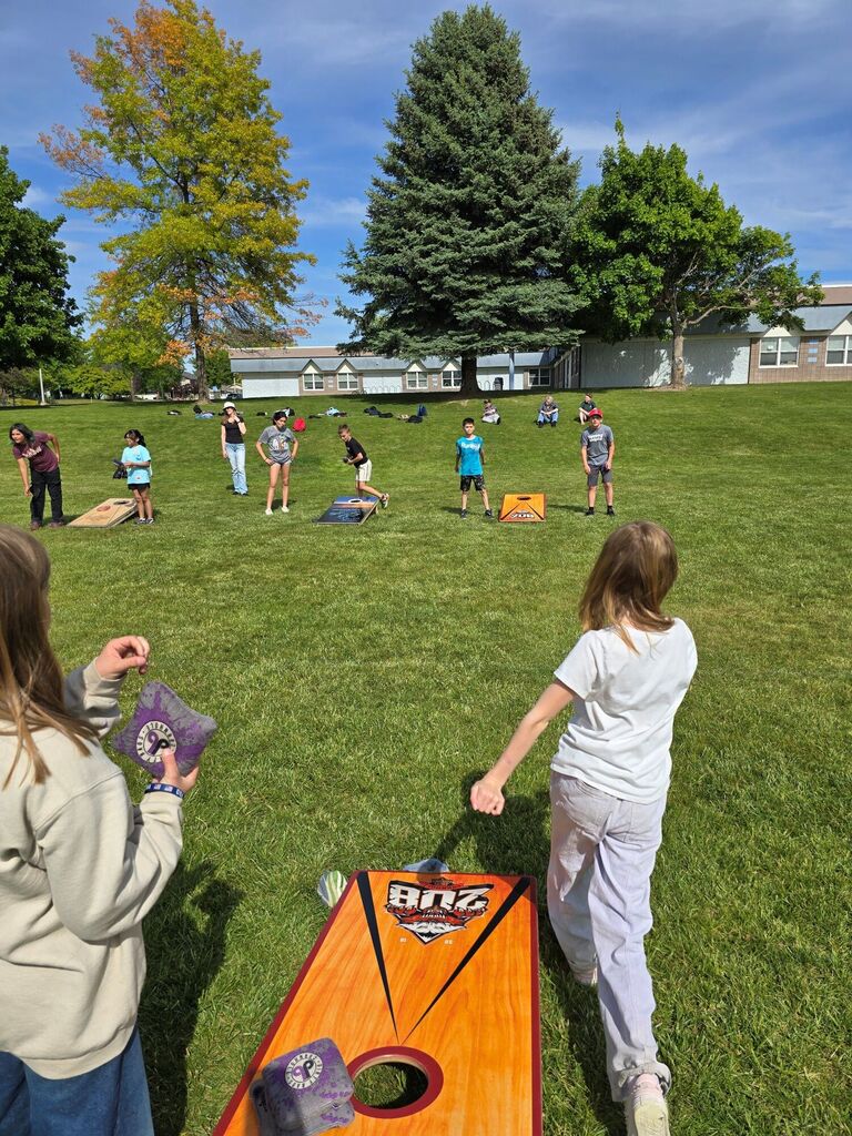 Kids at the  Arcadia Cornhole Club event