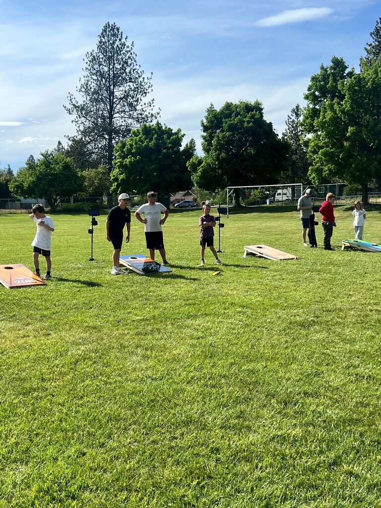 Kids at the  Arcadia Cornhole Club event