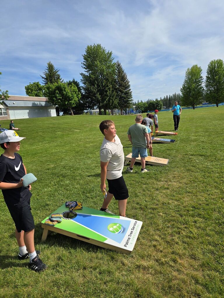 Kids at the  Arcadia Cornhole Club event