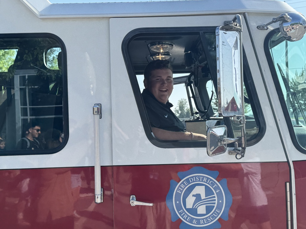 Fire Dept. 4 senior send of photos of student with the fire truck.