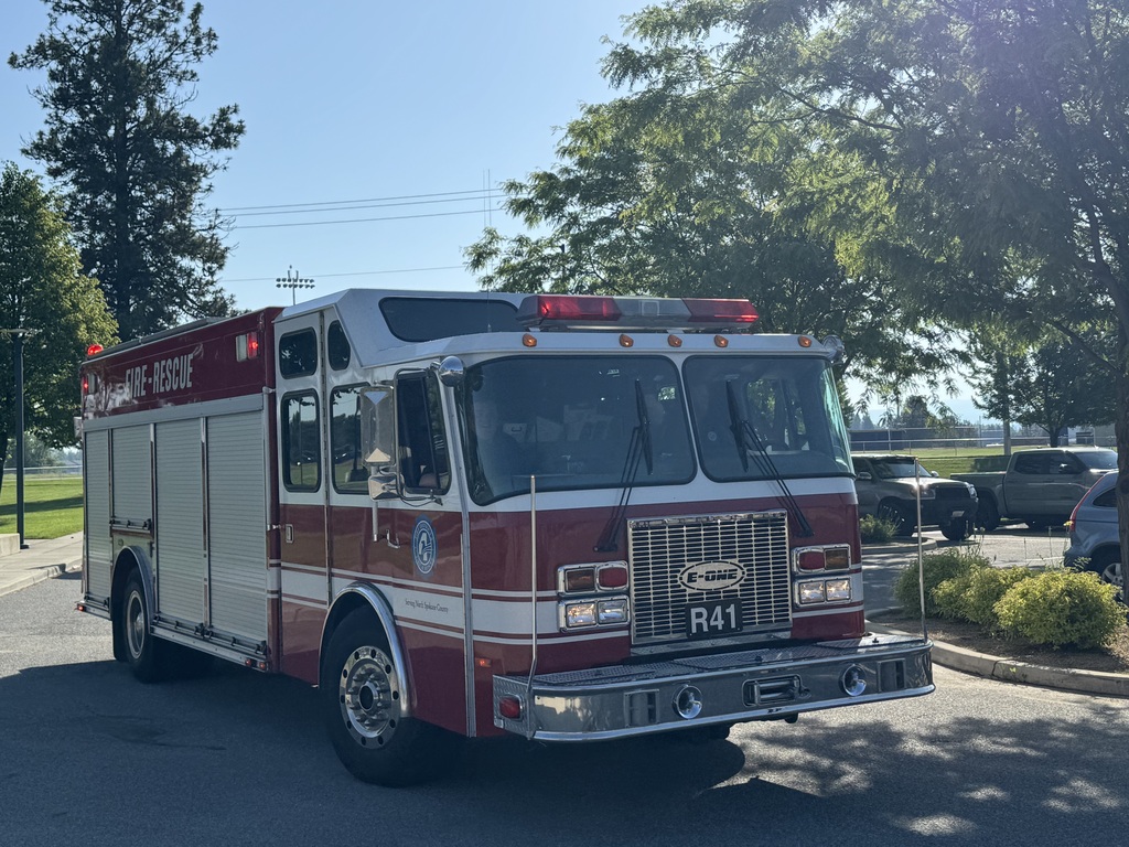 Fire Dept. 4 senior send of photos of student with the fire truck.