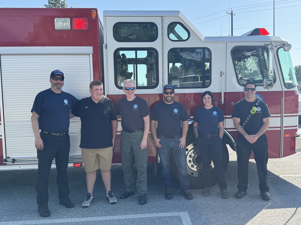 Fire Dept. 4 senior send of photos of student with the fire truck.