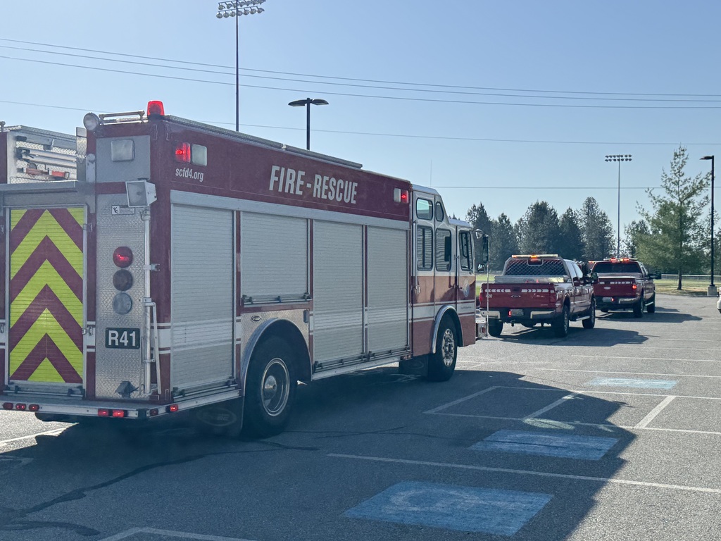 Fire Dept. 4 senior send of photos of student with the fire truck.