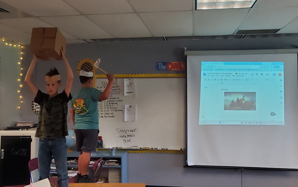 Students reenacting revolutionary war paintings
