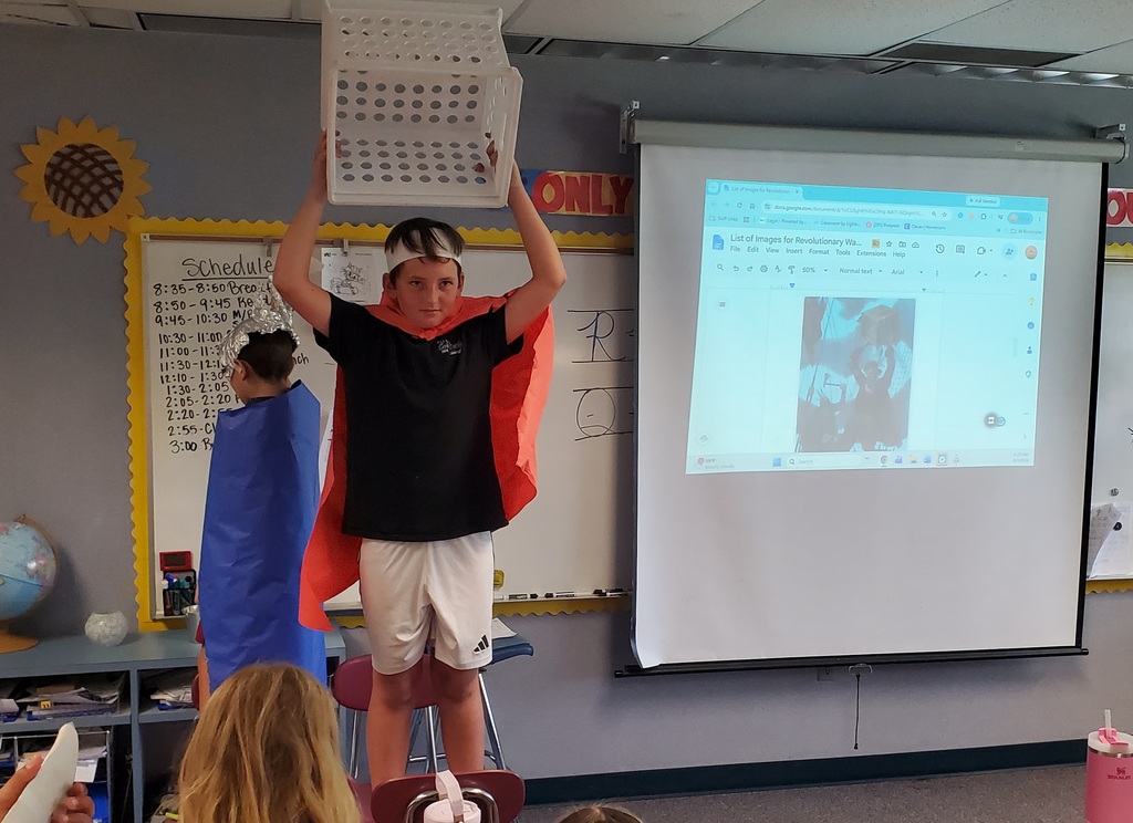Students reenacting revolutionary war paintings