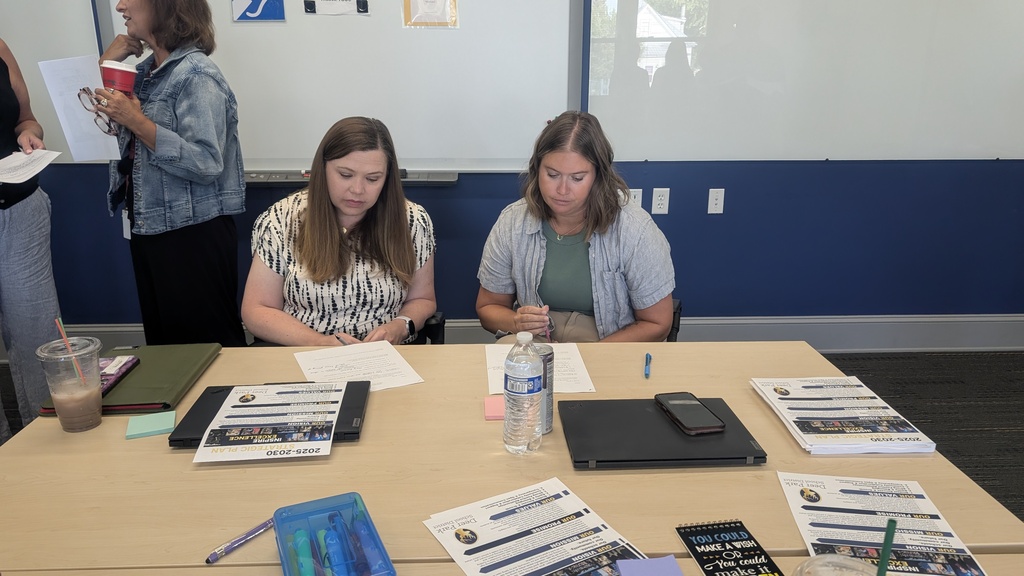 Staff meeting together to plan the 26-27 school year