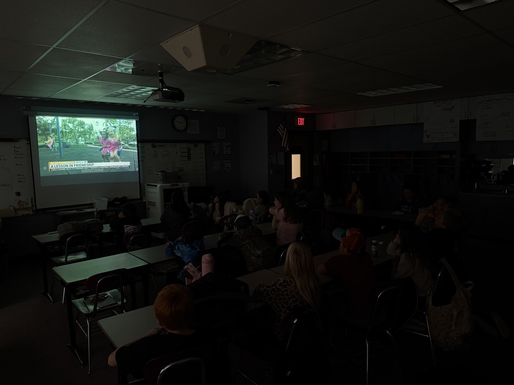 A class watching kindness 101 videos