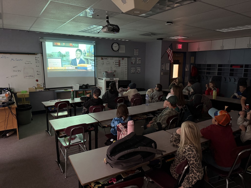 A class watching kindness 101 videos