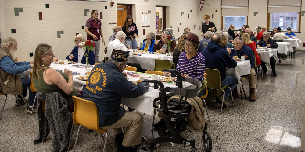 veterans enjoying breakfast  in cafeteria