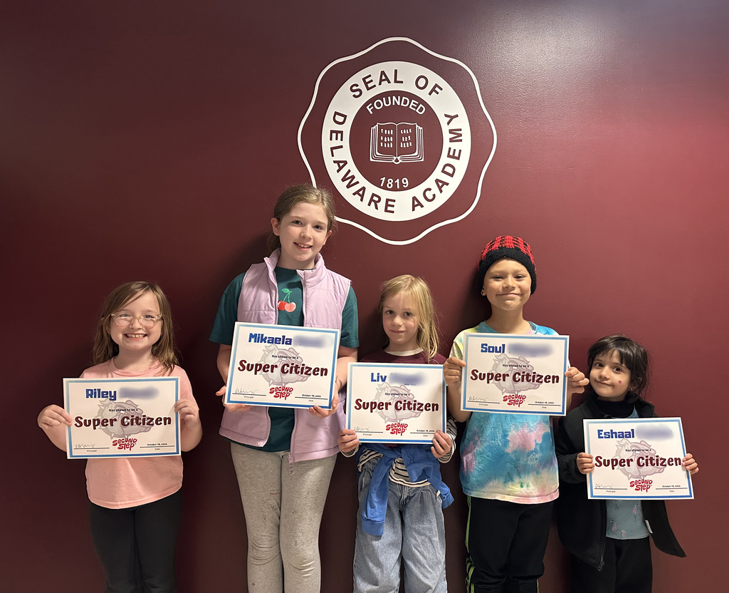 5 elementary students holding certificates for Super Citizen
