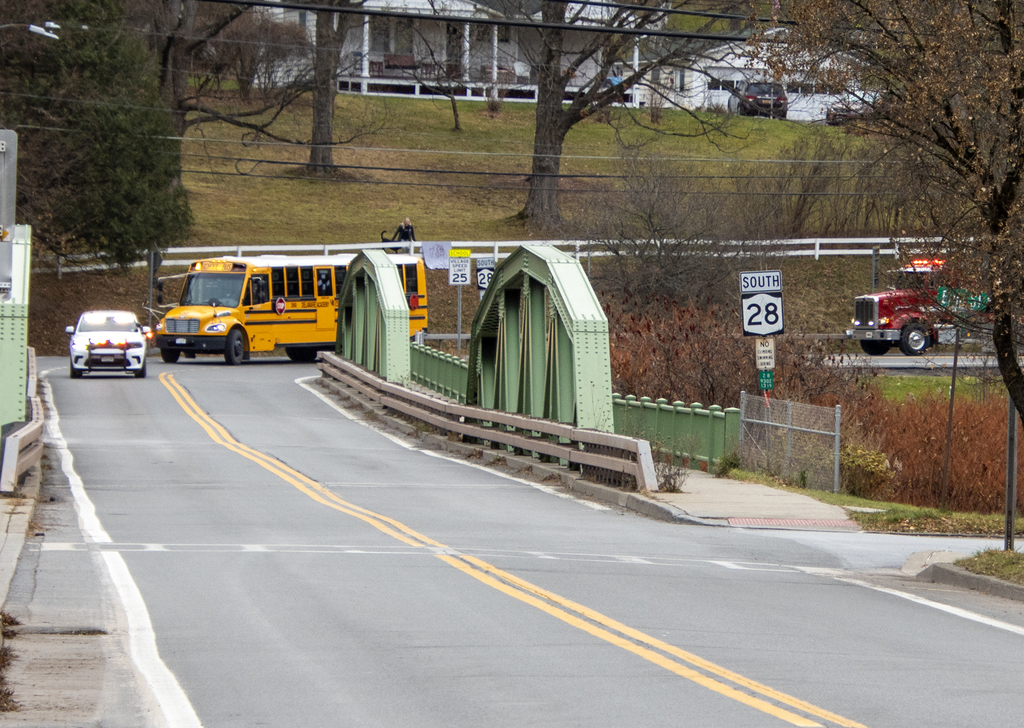 police car and bus visible, fire truck as well