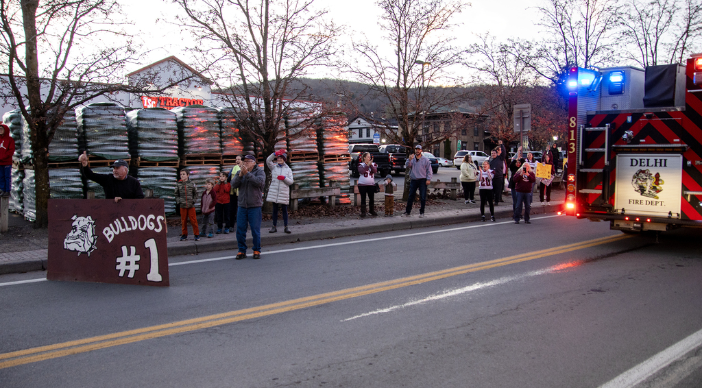 people cheer, Bulldogs #1 sign