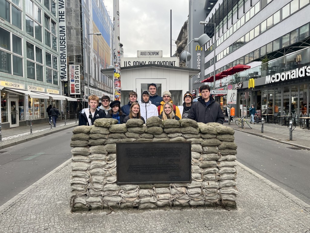 group of studeents at Checkpoint Charlie