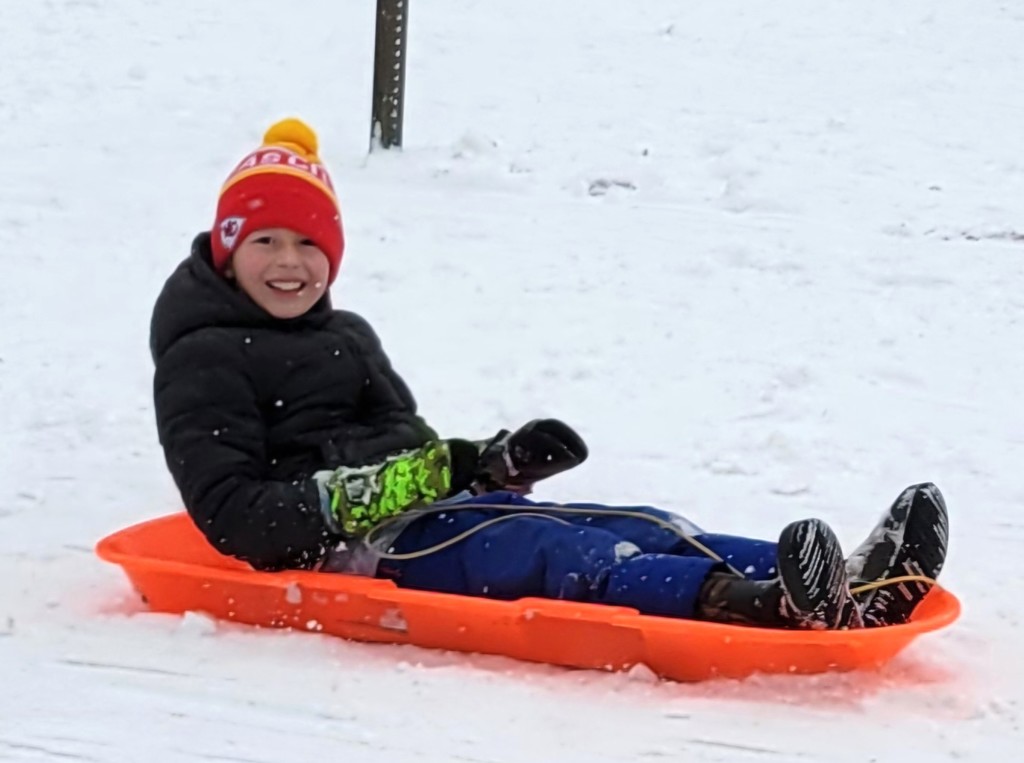 1 child sledding