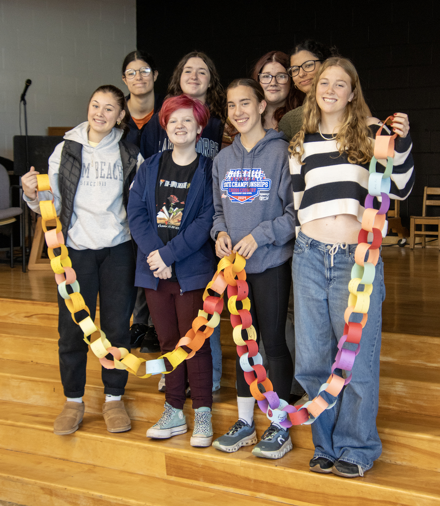 high schoolers with paper chain