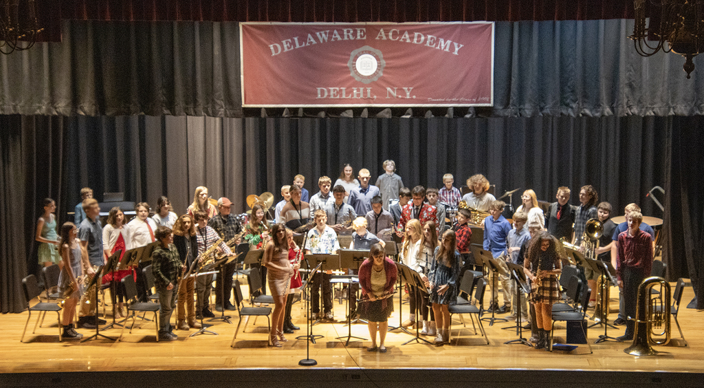 conductor and band take bow