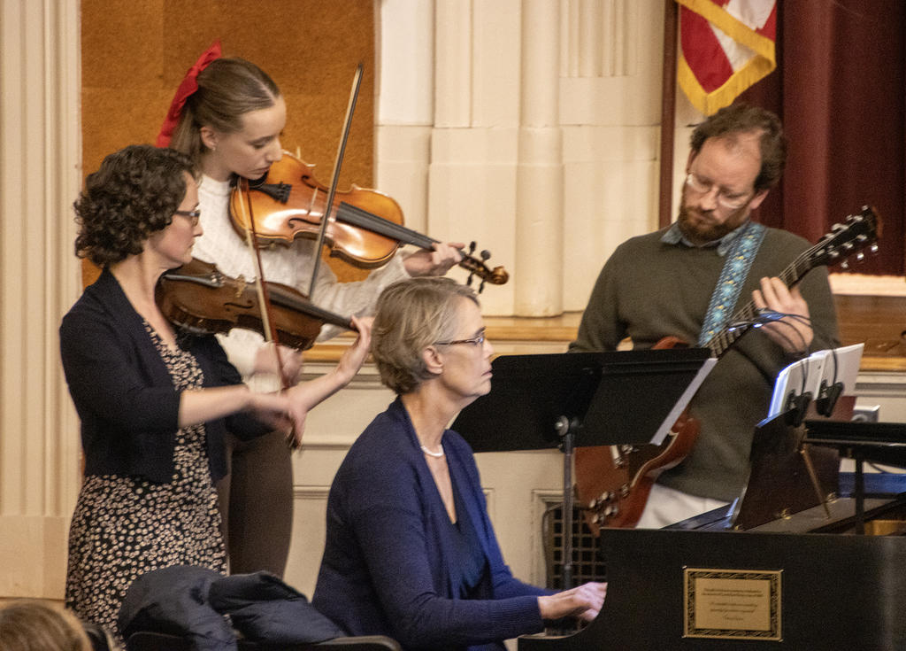 3 string players and a pianor player